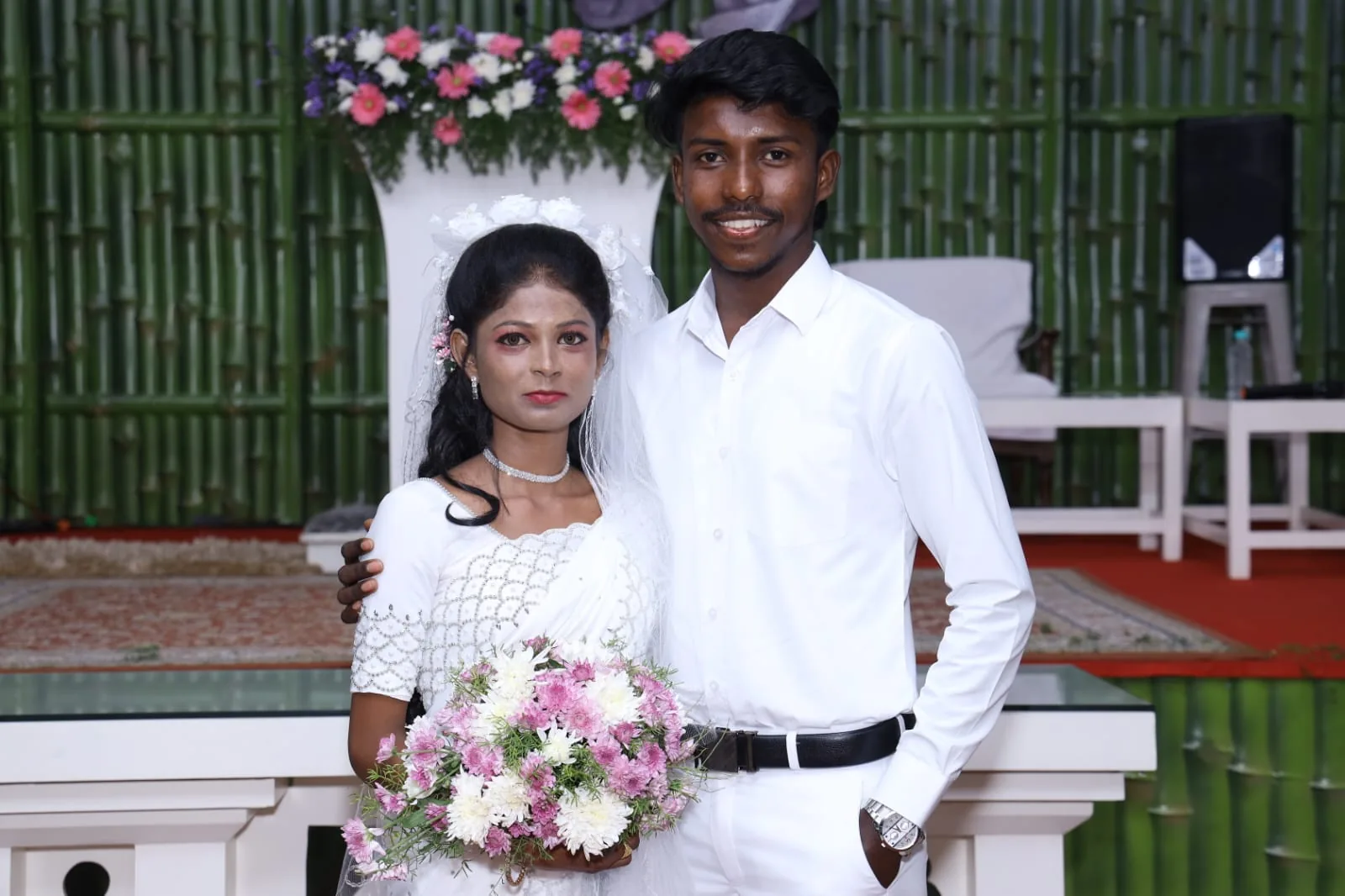 Bride and groom Ilavarasan and Vandhana at their church wedding ceremony