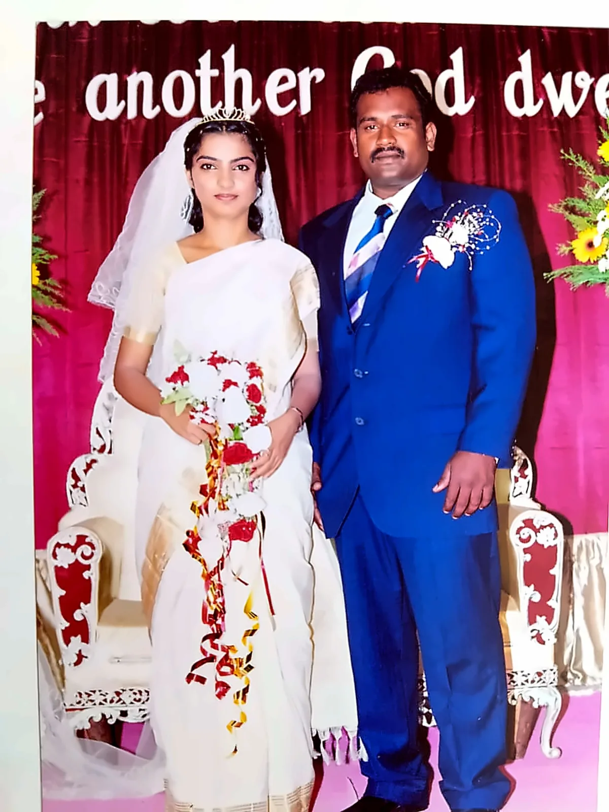 Portrait of Balaji and Omika at their 2006 Christian wedding in Chennai catered by Joy Caterer