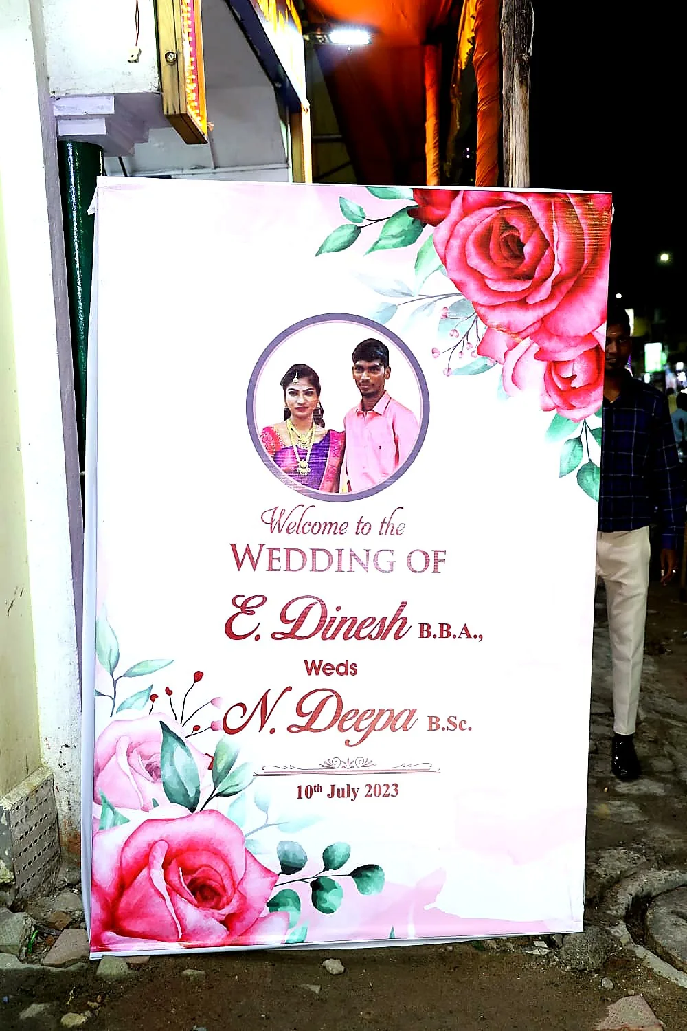 Gold-framed wedding welcome board for Ilavarasan and Vandhana at a Chennai reception catered by Joy Events & Catering